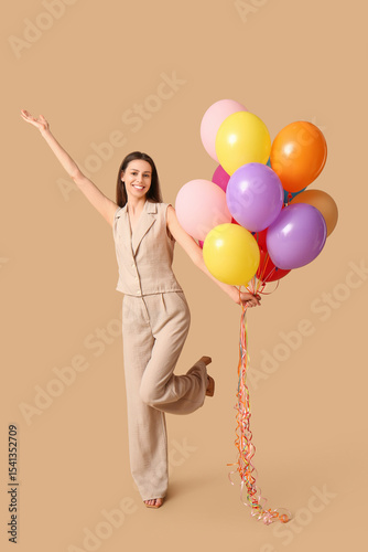 Happy young woman with colo...