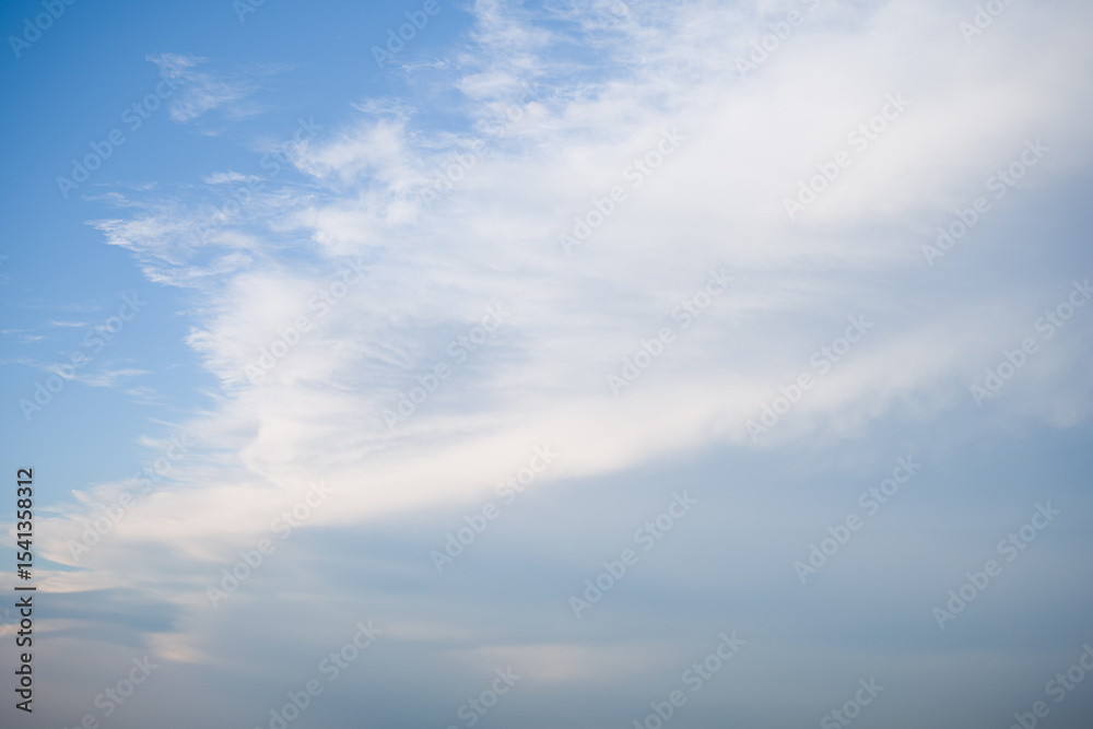 Obraz premium Blue Sky with Wispy Clouds