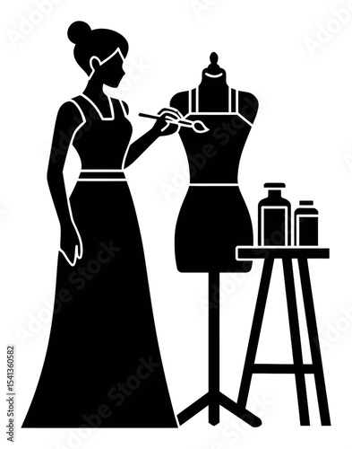 Creative Artist Working on a Dress Design with Dress Form in Studio