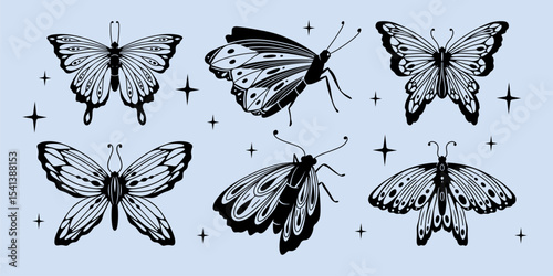 Black butterfly silhouettes collection with ornate wings, dots and swirls in y2k retro style. Decorative insects with small accents on background for tattoo designs, stickers or digital art.
