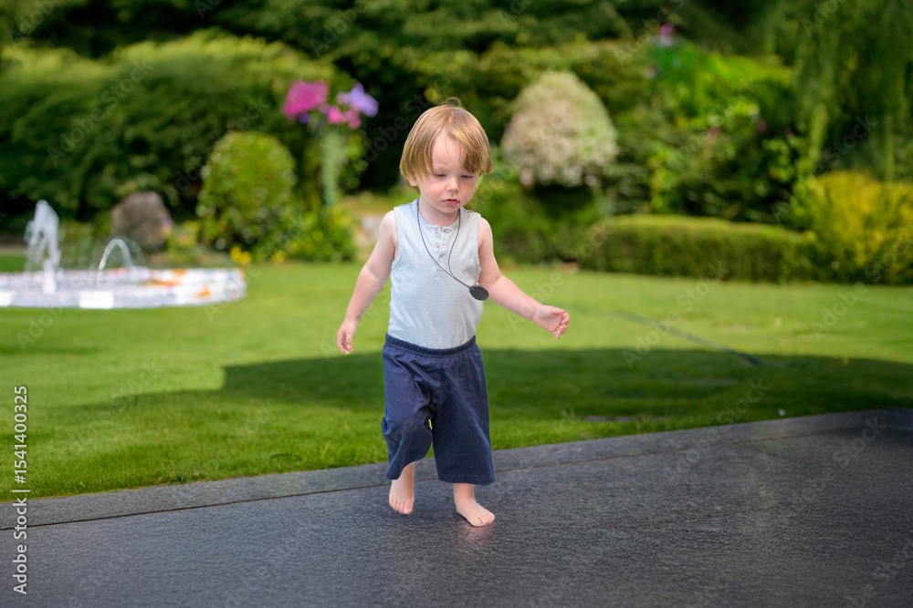 Fototapeta premium Barefoot Toddler Walking Outdoors