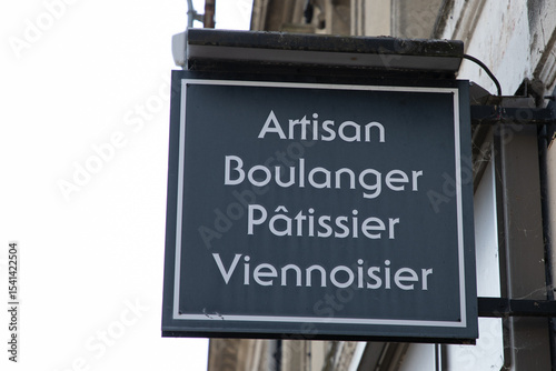 artisan boulanger patissier viennoisier sign text french means artisan baker and viennese pastry chef bakery traditional breads france