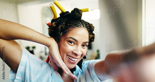 Photos Beauty, girl or selfie with curlers in home for getting ready vlog, morning routine and portrait