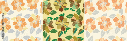 Sophisticated floral pattern featuring large stylized blossoms and leaves. Offered in a soft orange/grey/light background, and a warm brown/green/yellow combination for diverse uses