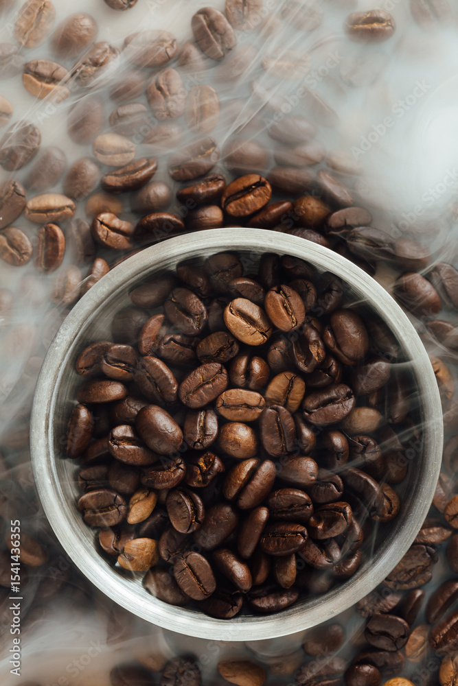 Fototapeta premium Freshly Roasted Coffee Beans in Round Silver Bowl on Table