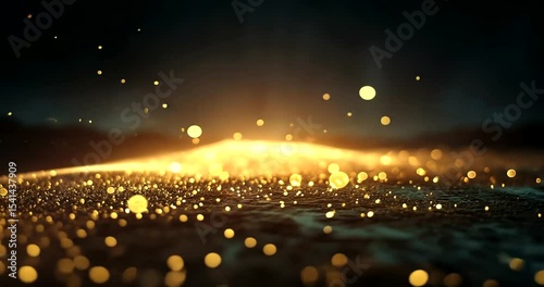 Glimmering golden particles illuminating dark landscape