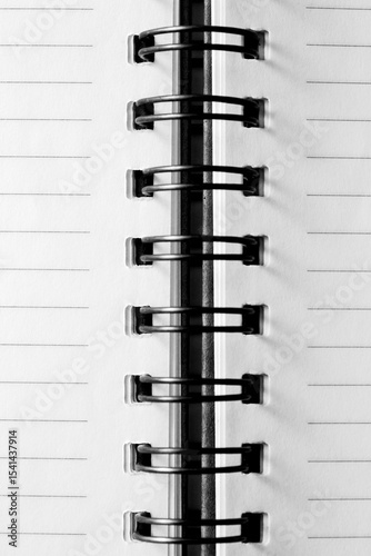 Close-Up View of Spiral Binding on Blank Notebook Pages