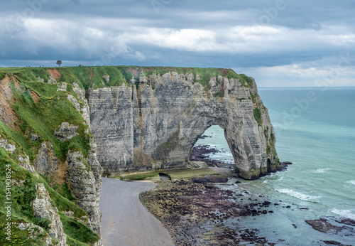 Landscape with spectacular beaches and high cliffs at Etretat, Normandy, France.