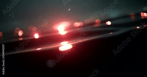 Glimmering Water Surface with Reflections at Dusk