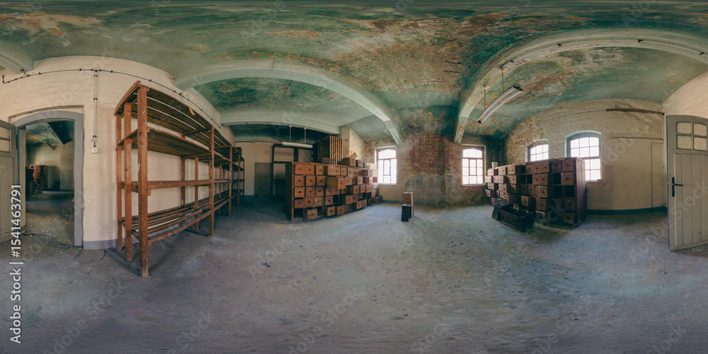 Obraz premium 360-degree view of an abandoned pipe factory. Old furniture, workbenches, and decaying walls reflect the charm of industrial history. Perfect for urban exploration and decay themes.