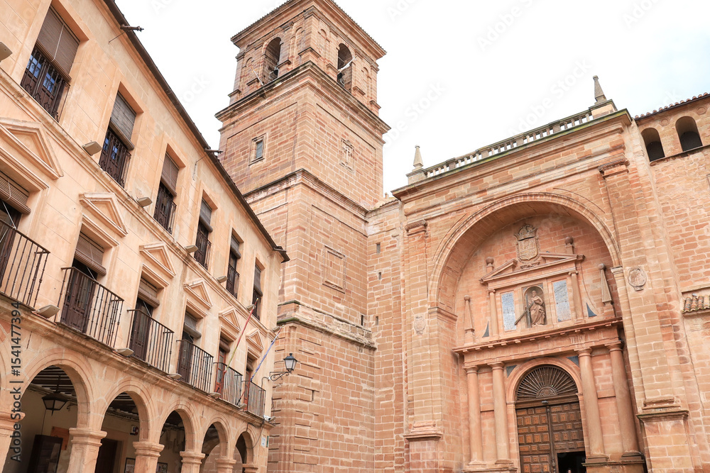 Fototapeta premium Plaza Mayor Square and San Andres church in Villanueva de los Infantes town