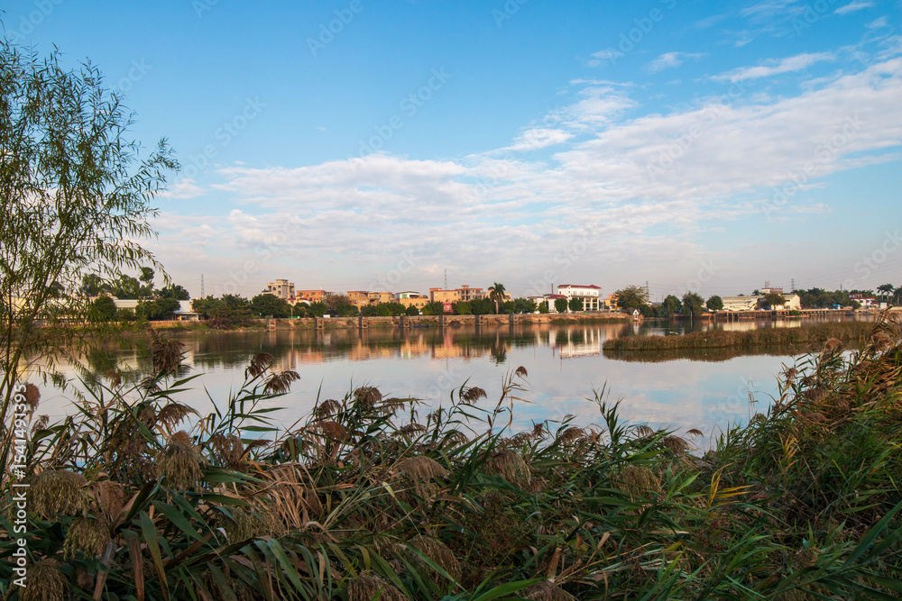 Obraz premium sunset over the river