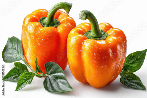 Two orange bell peppers on white background