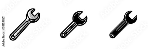 A spanner tool icon is depicted as a modern illustration of a wrench symbol in black silhouette, used for maintenance work