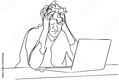 Stress and frustration while working on a laptop in a home office environment