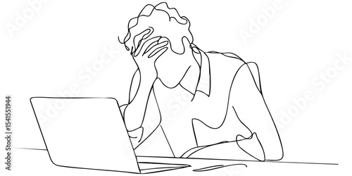 Frustrated individual faces difficulties while working on laptop at a desk