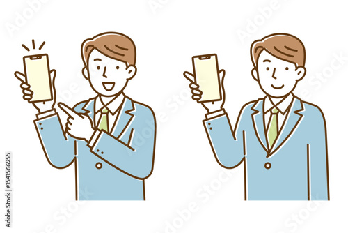 スマートフォンを持ってこちらを見ているスーツ姿の若い男性