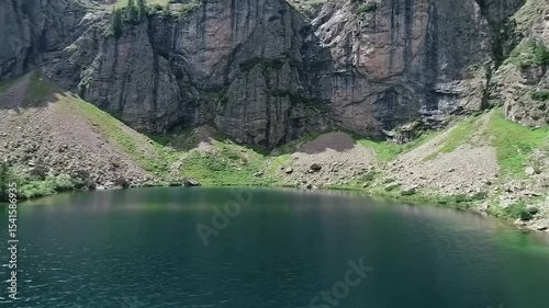 Mountain lake nestled in a rocky valley