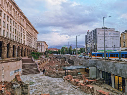 Panoramic view to Serdica archaeological park at sunset  with a view to the Central Department Store building, Vitosha mountain and Saint Nedelya Orthodox Cathedral, Sofia, Bulgaria 