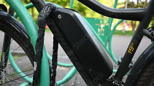 An Eco Friendly Electric Bike Parked Securely, Representing Green Urban Transportation.