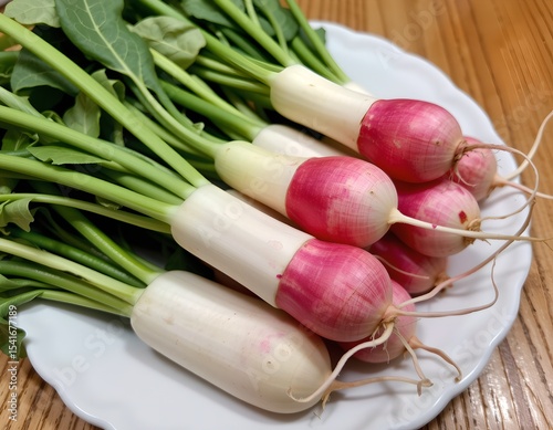 Fresh Organic Radishes with Green Tops on White Plate Close Up