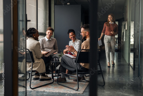 Group of Colleagues Collaborating in a Modern Office Space