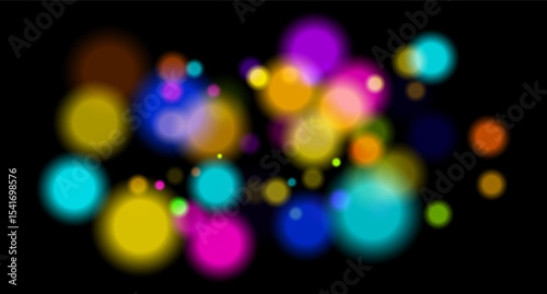 Multicolored glowing circles on dark background. Blurred soft shapes of various sizes create abstract festive atmosphere.