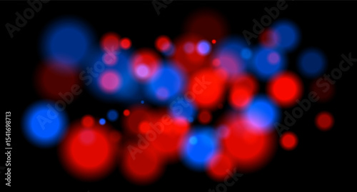Multicolor blurred circles on dark backdrop. Bright glowing particles form warm atmospheric visual effect.