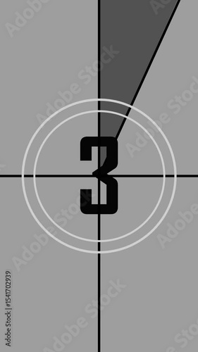 Old Style Movie Countdown Vertical Video. Vertical vintage film countdown leader with numbers on gray background, retro cinema style.
