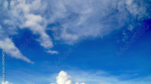 clouds and blue sunny sky,  white clouds over blue sky, Aerial view,  nature, blue sky, white clear weather. Time lapse video 4 K.