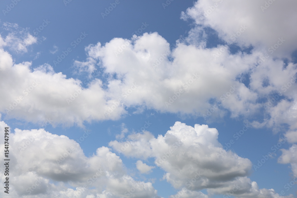 blue sky and white big clouds blue sky and white big clouds