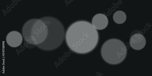a background with several gray circles of different sizes on a black background, with a soft blurred effect. The circles overlap, creating a depth effect.