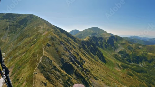 Spring Paragliding Over Alps, Proximity Flying Above Green Mountain Ridges