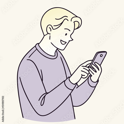 Smiling young man is typing on his mobile phone and looking down