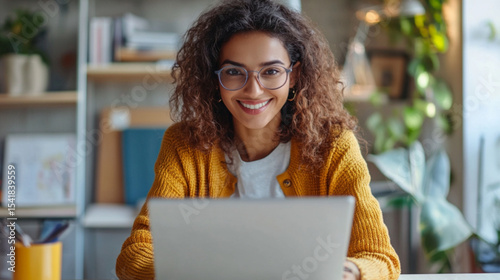 young woman working on laptop