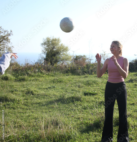 teenage girl playing ball outside, lifestyle people concept