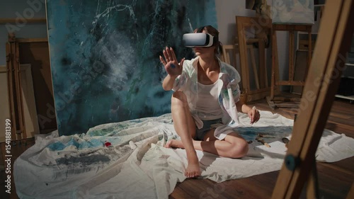 An Artist Uses VR to Immerse Himself in a Virtual Studio, Creating and Exploring New Artistic Worlds. Combines Traditional Art Techniques with Modern Digital Tools in an Innovative Virtual Environment