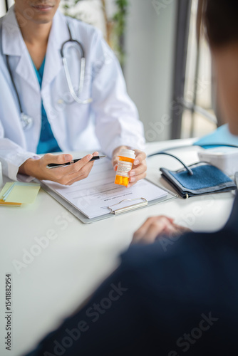 A doctor giving prescription.