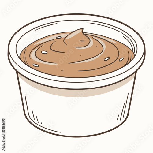 Brown creamy sauce in a small plastic cup