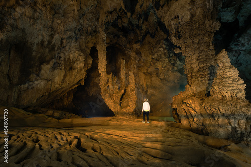 Solo female exploring the cave system of Cao Bang province in northern Vietnam