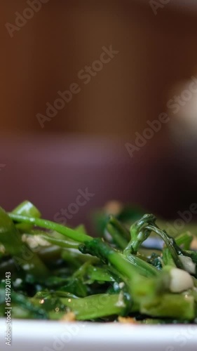 Stir-fried Mussel with Morning Glory. High quality 4k footage