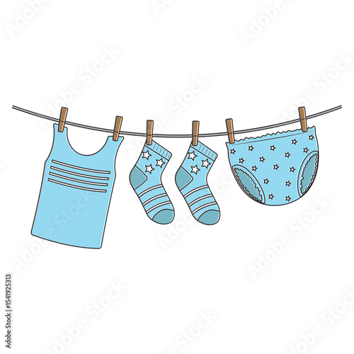 Drying wet children's clothes hung on a clothesline