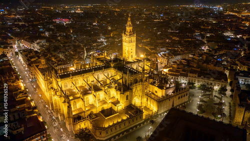 Aerial Night View of Illuminated Cathedral in Cityscape