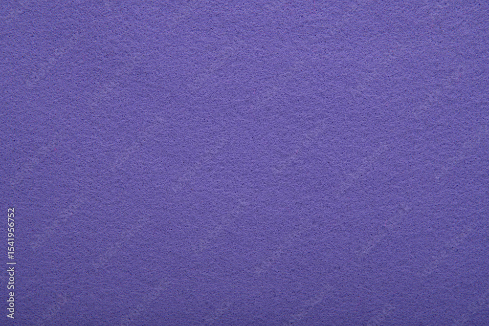Fototapeta premium Purple Felt Texture Background – Close-Up of Soft Fabric Surface. Seamless background, graphic design, scrapbooking, textile layouts, creative projects.