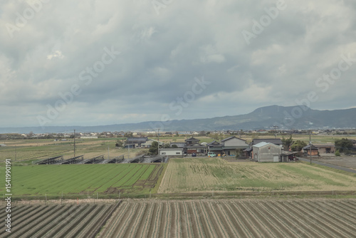 March 24 2025 the Expansive Countryside Farmland Under Cloudy Skies, japan
