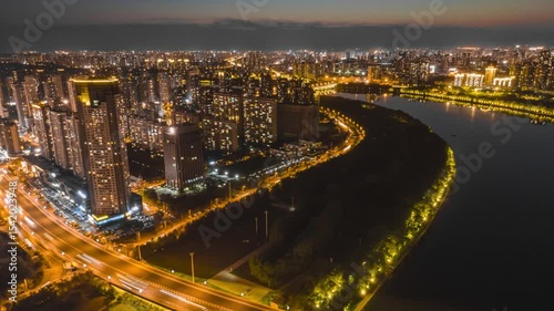 Aerial cityscape time lapse of hunhe bay and changbai island in shenyang at night