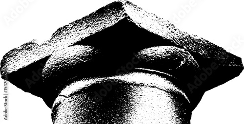 Eroded stone pillar fragment in high contrast black and white design