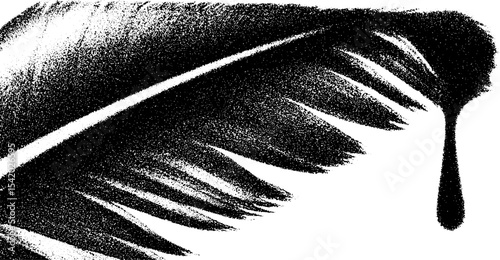High contrast feather quill with ink droplet in black and white for creative design
