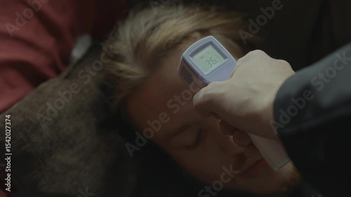 Checking temperature with infrared thermometer 4k
