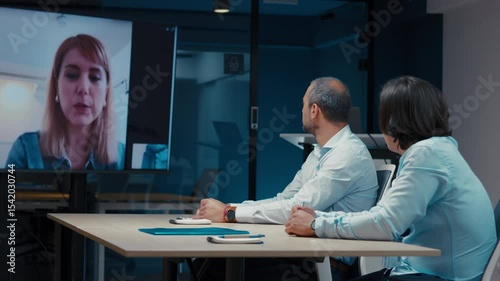 Remote Video Conference in Modern Office Setting